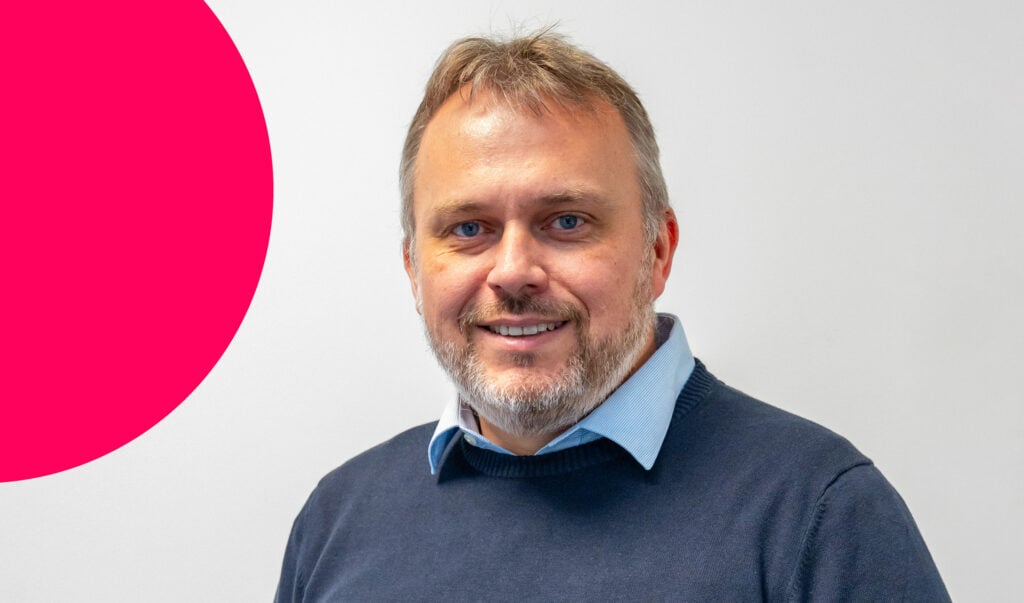 A man's head-and-shoulders professional photo